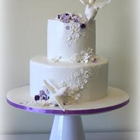 Birds and purple wedding cake