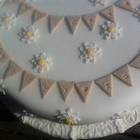 Daisies and bunting wedding cake
