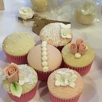 Anemone, peony and ranunculus wedding cake and cupcakes