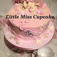 Pink buttercream 1st birthday cake
