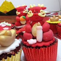 Dragon themed cupcake for 1 month celebration