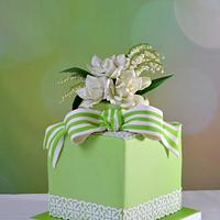 cake with lace, gardenia and lily of the valley