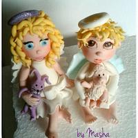 Cute angels christening cake
