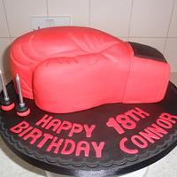 red boxing glove birthday cake