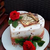 Heart shaped cake with red roses