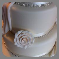 Roses & drapes wedding cake