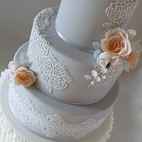 Grey and peach lace wedding cake