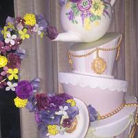 Topsy turvy mad hatter wedding cake