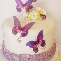 Butterfly and Hydrangea wedding cake with cupcakes