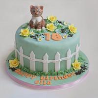cat in a garden cake