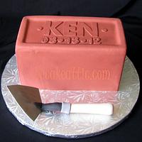Terracotta brick groom's cake with trowel