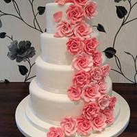 Cascading Coral Rose Wedding Cake