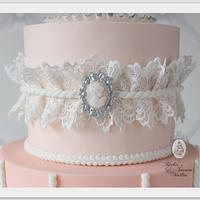 Pink and lace gravity defying cake
