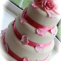 Three tier pretty in pink wedding cake