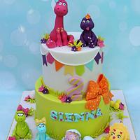Girl dinosaurs - Cake by Shereen - CakesDecor