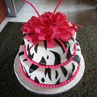 Zebra Print with hot pink pompom bow