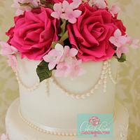 Hot Pink roses and antique lace wedding cake