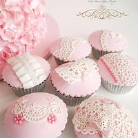 Pink Ruffle Cake with matching lace and pearl cupcakes