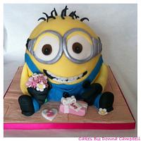 Minion cake with flowers and a present