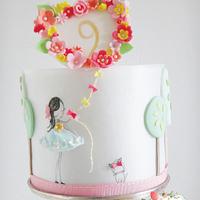 Girl with kite birthday cake