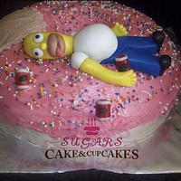 Donut-shaped cake with Homer simpsom