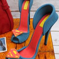superman man themed handbag and stilhetto shoes