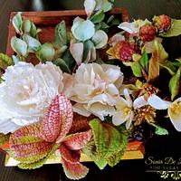 Flower arrangement (peonies, blackberries, eucalyptus, pilea and exotic leaves