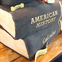 Stacked book graduation cake