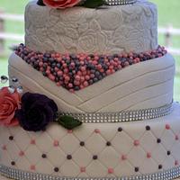 Wedding cake pink and purple roses