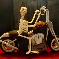 Skeliton riding a Harley.