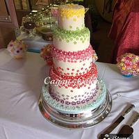 4 tier blossom covered wedding cake