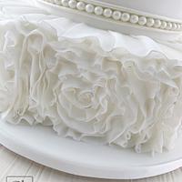 Ruffled, piped and shimmered Wedding Cake