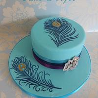 Peacock Feather Cake with matching Cup Cakes