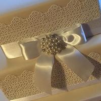 Lace & ribbon wedding cake