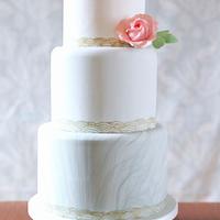 Ombre wedding cake with marbled bottom tier