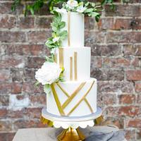 Gold and Greenery geometric wedding cake 