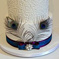 Peacock and roses wedding cake