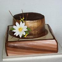 Brown cake with daisy