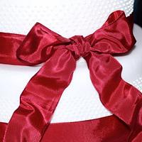 wedding cake white - red ribbon