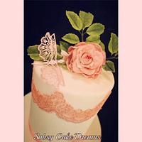 lace wedding cake with rose