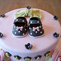 Baby shoes christening cake