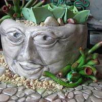 Stone flowerpot with succulents