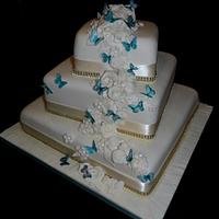 Twisitng Aqua & Ivory Wedding Cake