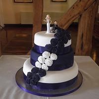 Purple & White rose wedding cake 