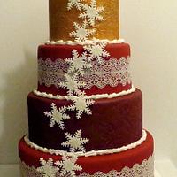 Red, Burgundy, Gold Christmas cake with white Ponsettia flower