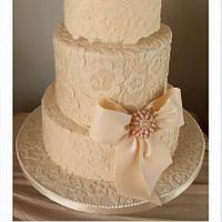 Simple lacy wedding cake 