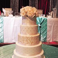 White hand painted wedding cake