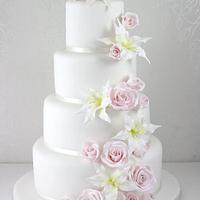 Rose and lily cascade wedding cake