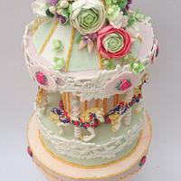 Floral cascade carousel cake 