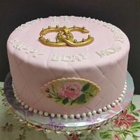 Chanel logo on baby pink cake